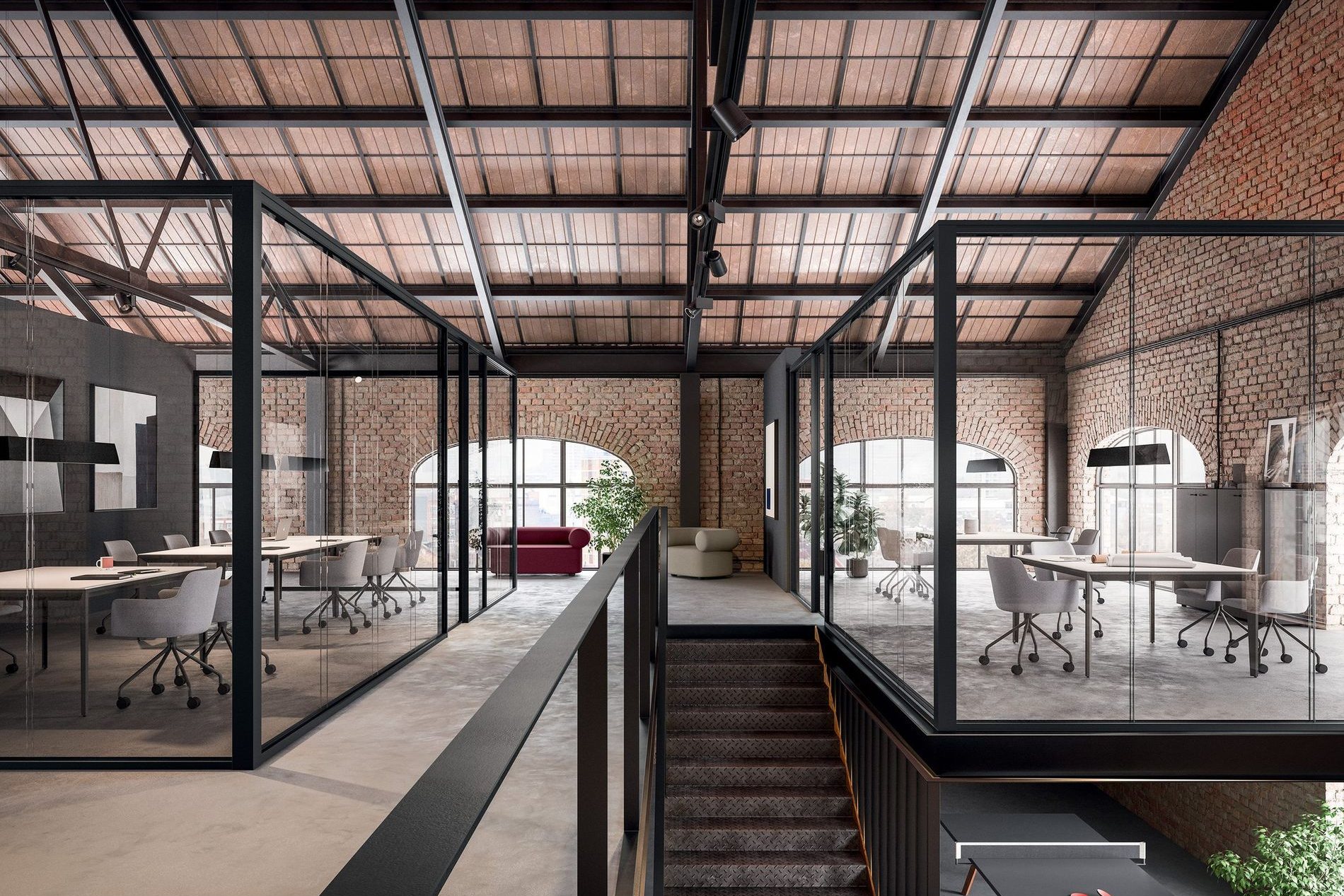 Open space su due livelli in un edificio industriale recuperato